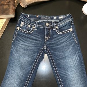 Miss Me Rhinestone Cross Bootcut Jeans